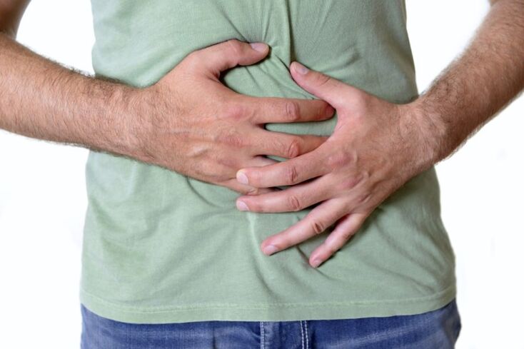 Pain and bloating - symptoms of worms in the intestines