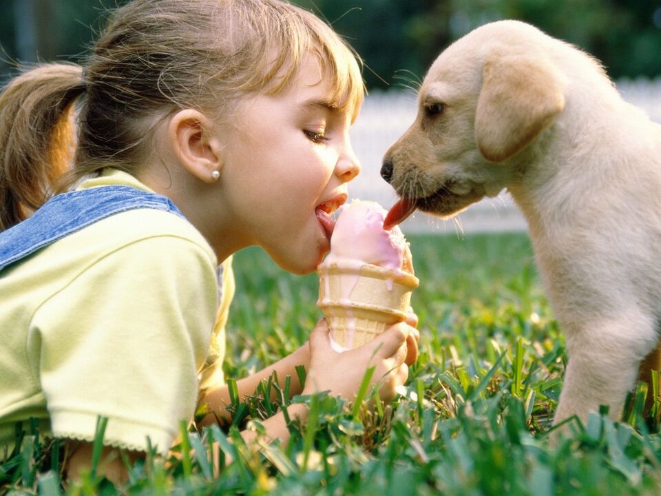 a girl and a dog eat ice cream and are infected with parasites